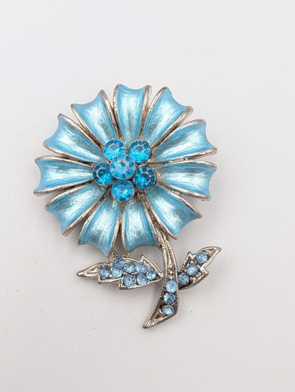 Vintage blue enamel and rhinestone silver tone flower brooch pin